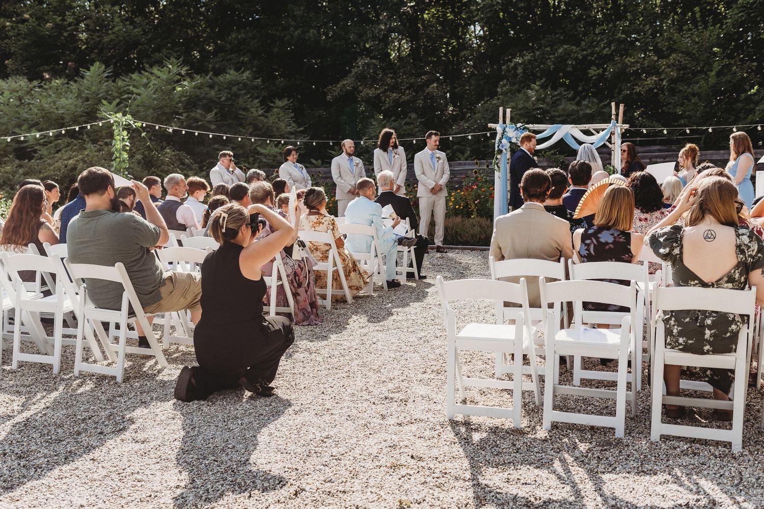Maine wedding photographer Chelsea Gallagher behind the camera capturing moments throughout a wedding day.