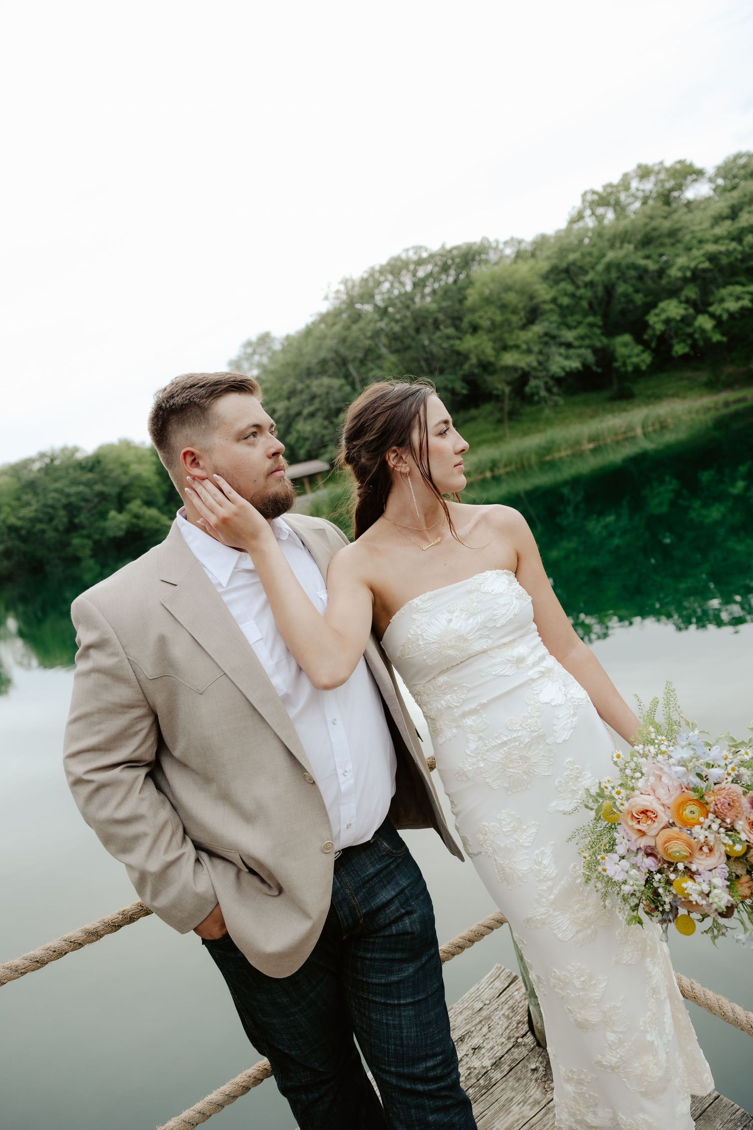 Wedding photos by the pond at Mallet Lodge at Platte River State Park.