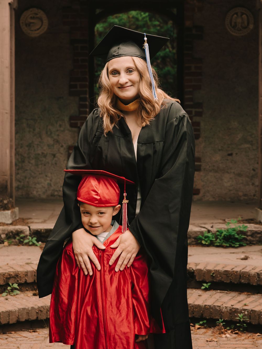 Preschool graduate & college graduate portrait, mommy & me graduation photos in caps & gowns, family graduation photos in caps & gowns