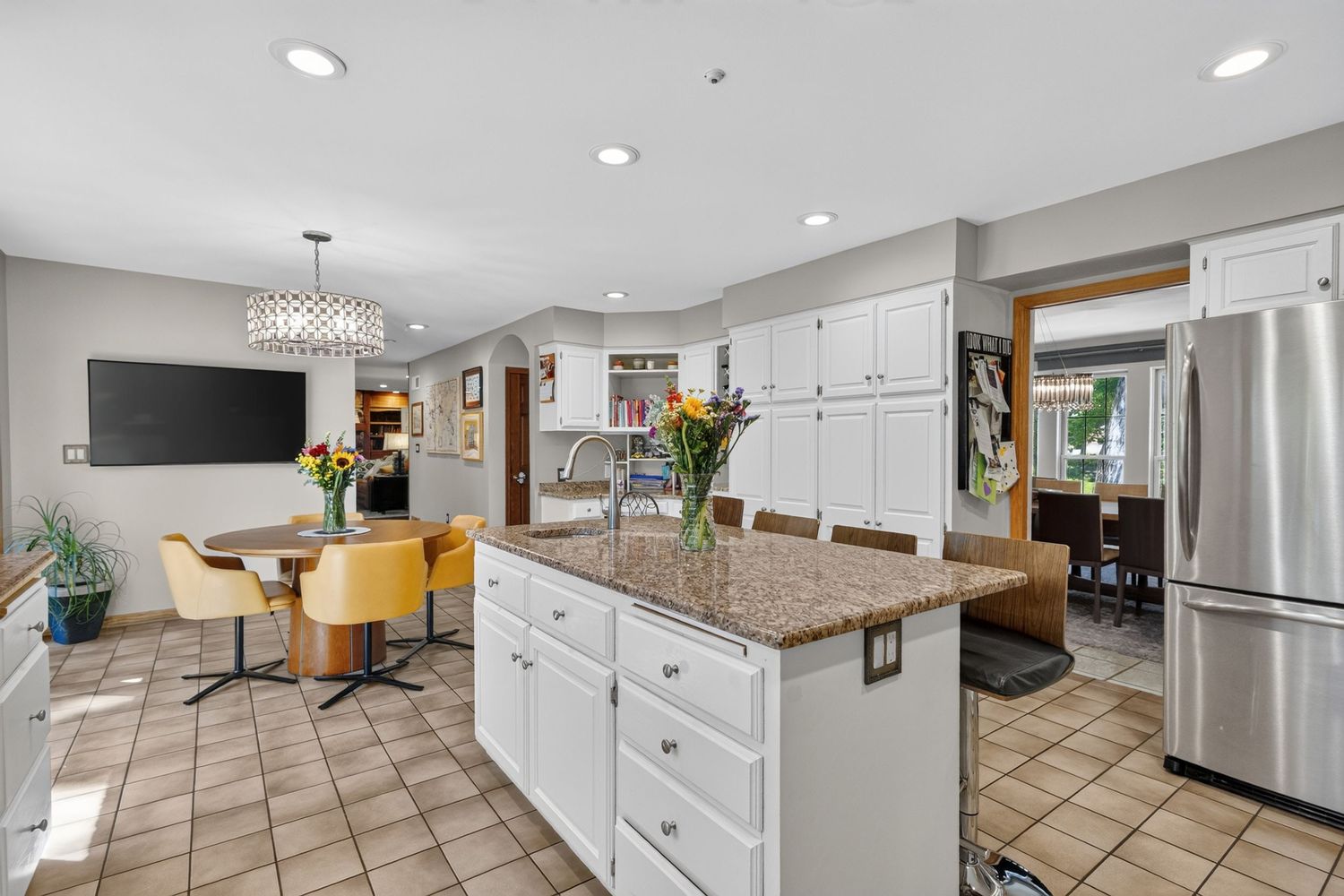 Bright white kitchen interior with island, real estate photography in Wisconsin