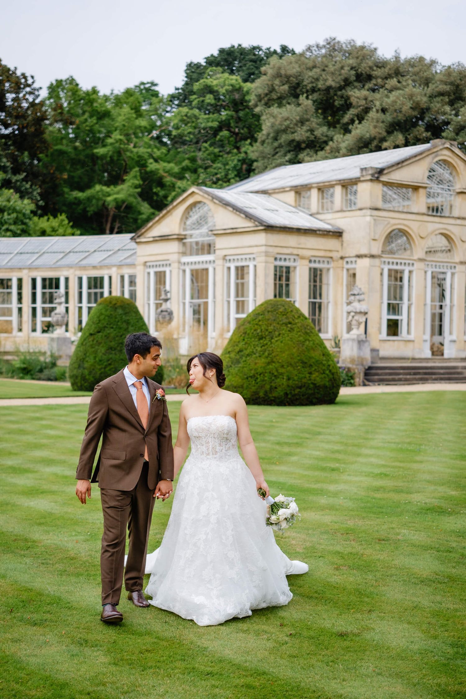 Bride and groom at the great Conservatory in Syon Park