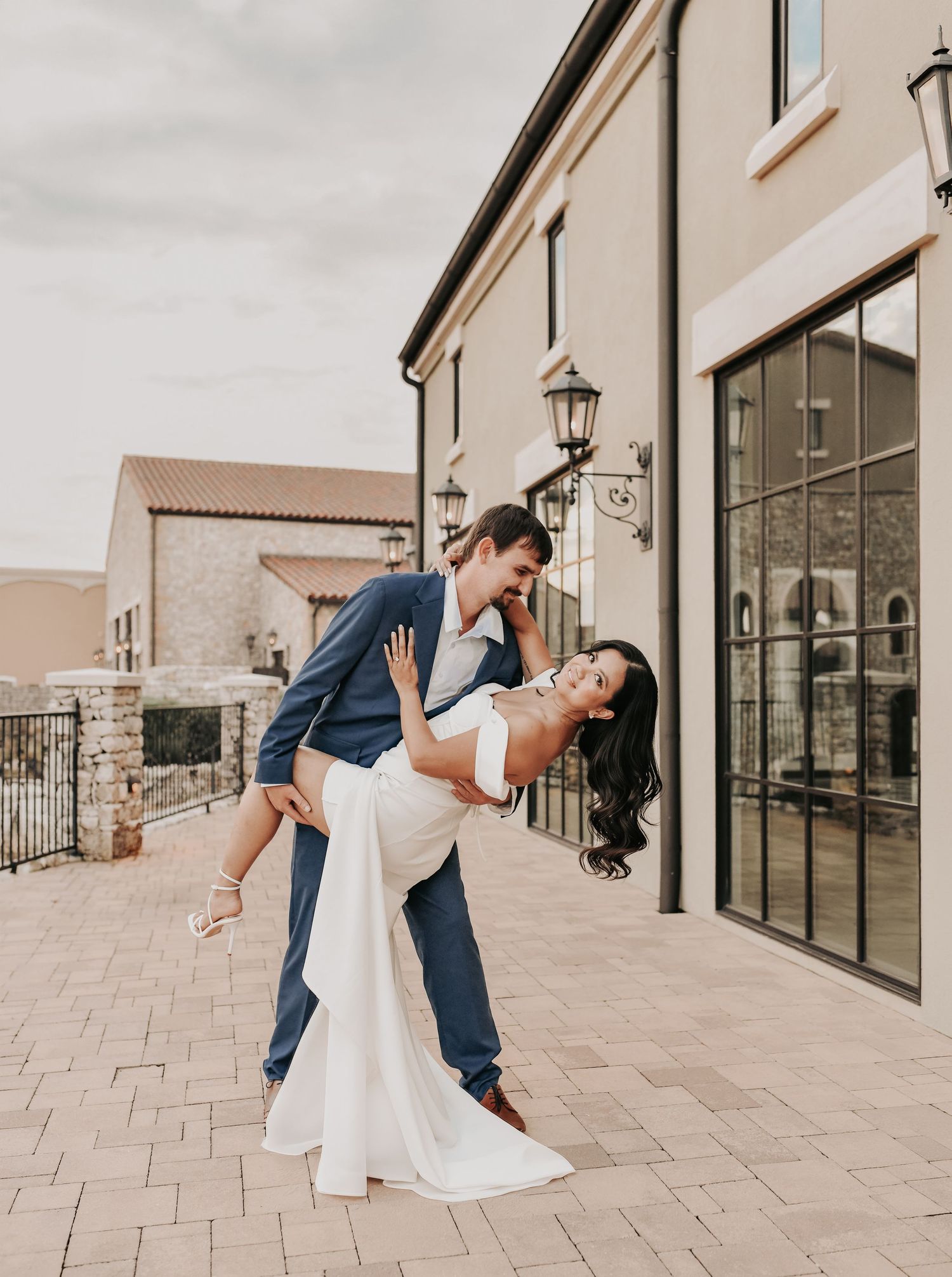Romantic North Texas engagement photos with soft evening light and waterfront views