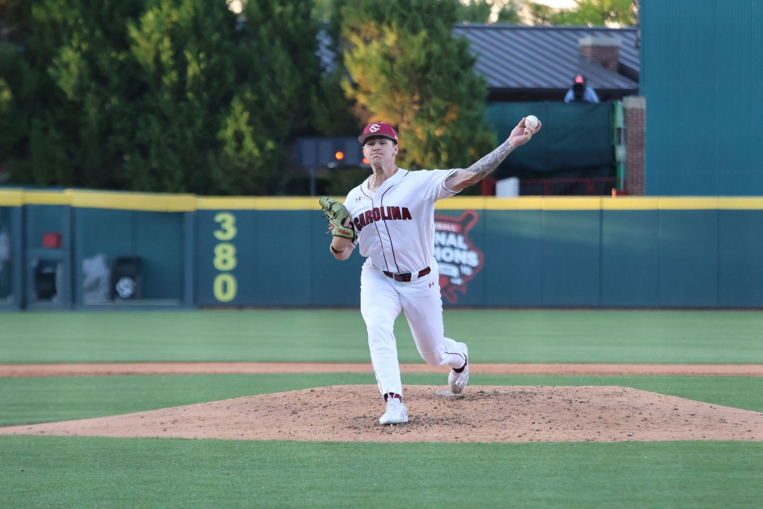 South Carolina baseball pitcher throws from the mound during a daytime game.
