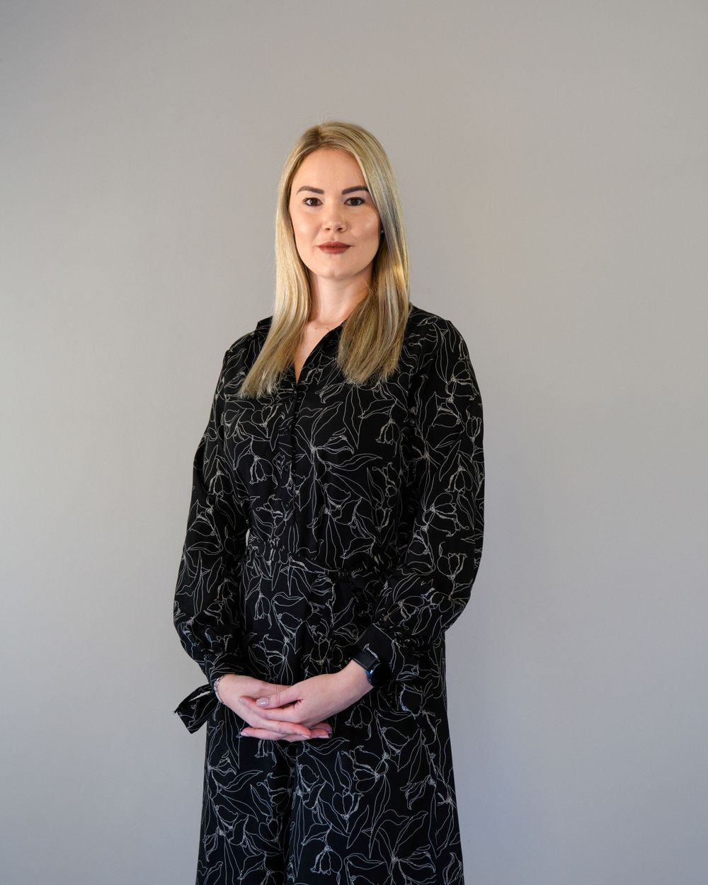 Lady posing for a staff photo shoot for an auditing firm in Johannesburg