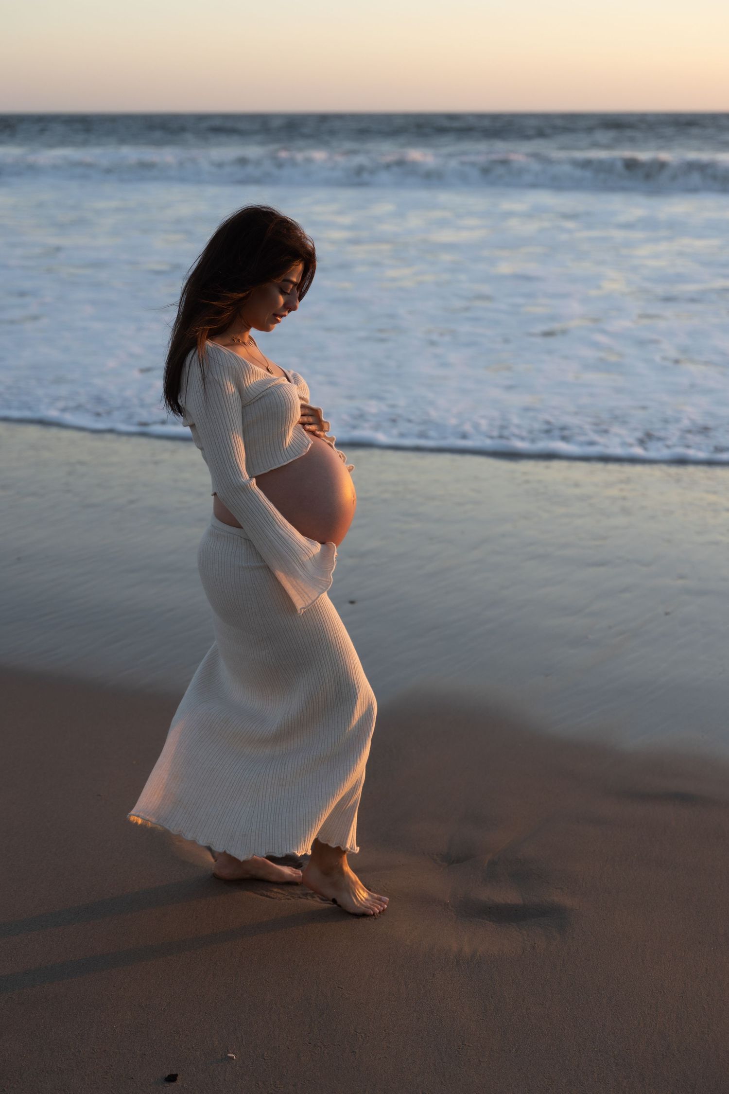 Outdoor maternity portrait session at sunset with natural light