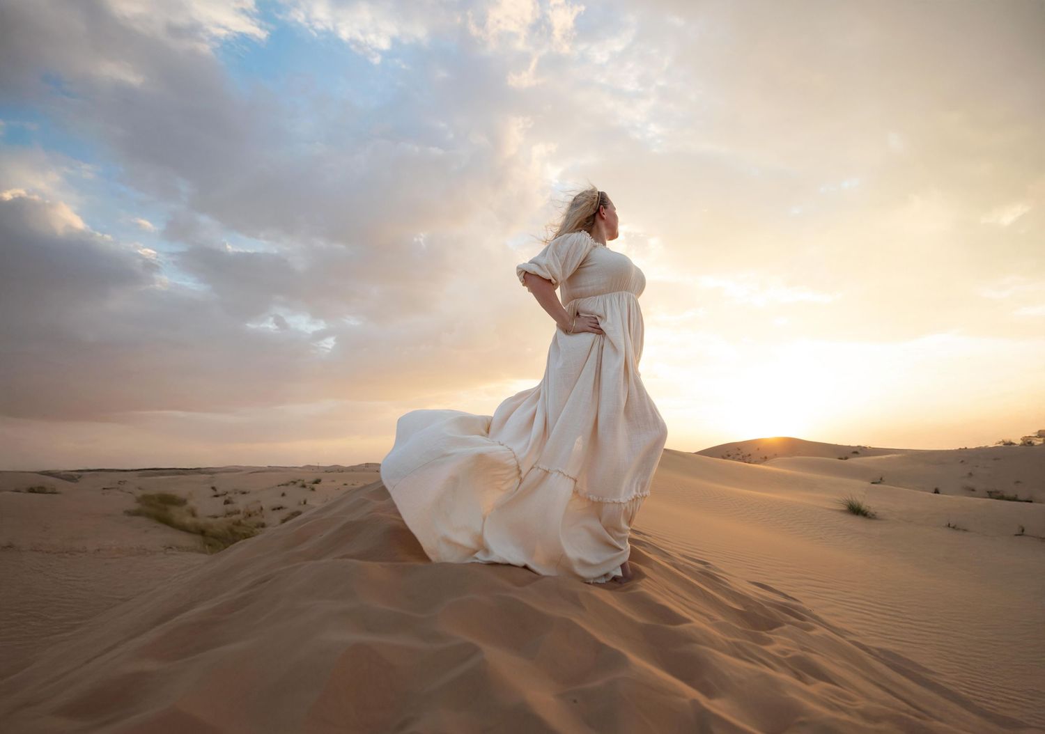 desert photoshoot with client closet dresses in abu dhabi
