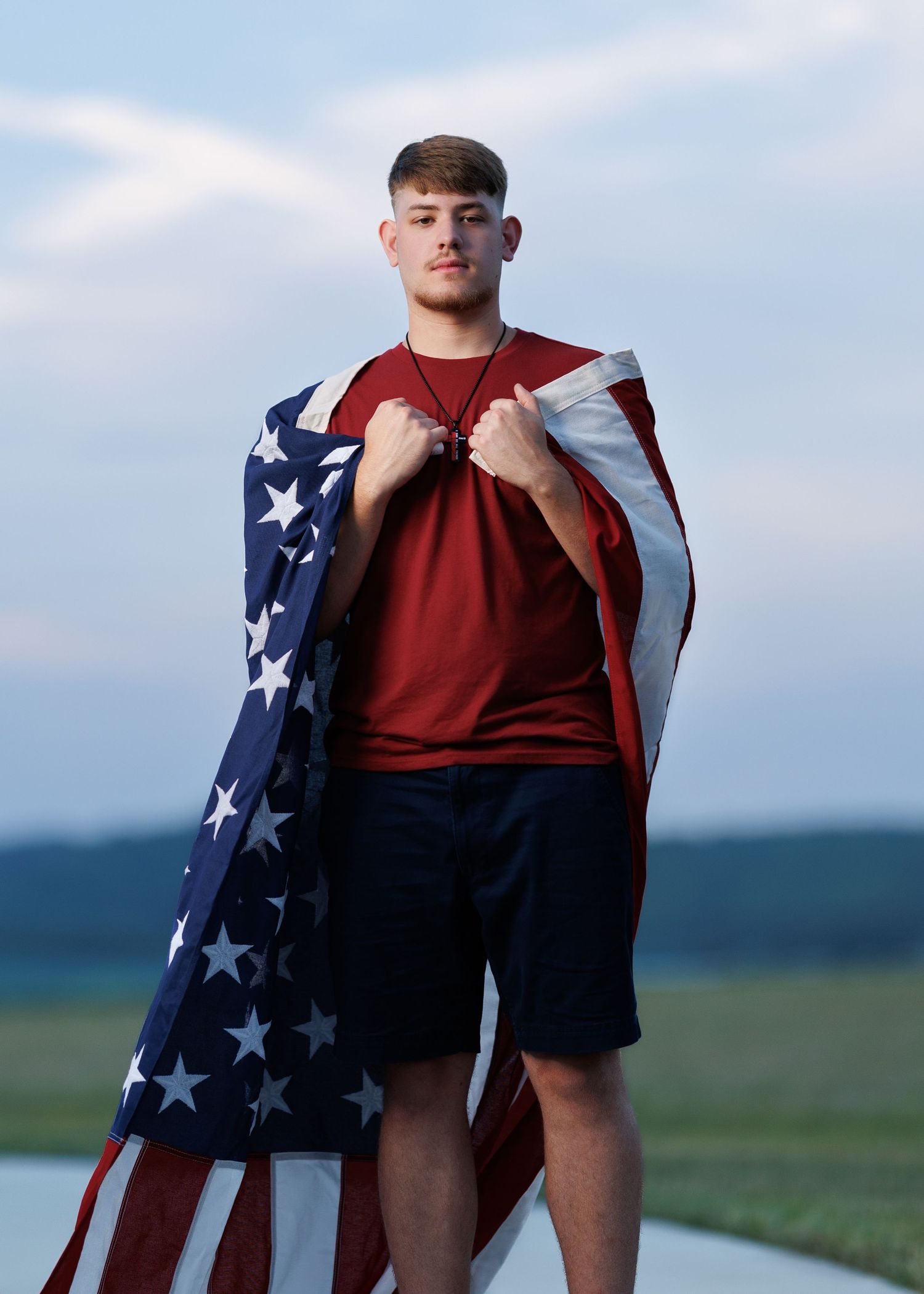 Senior portrait with an American Flag