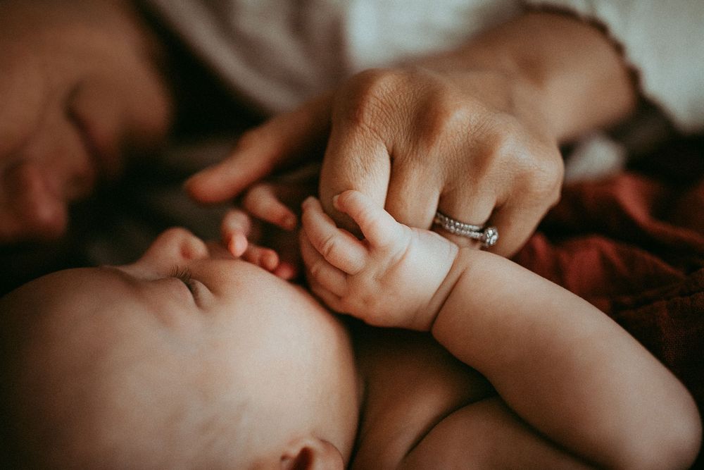 Close-up images capturing intimate details of hands and skin in warm natural lighting.