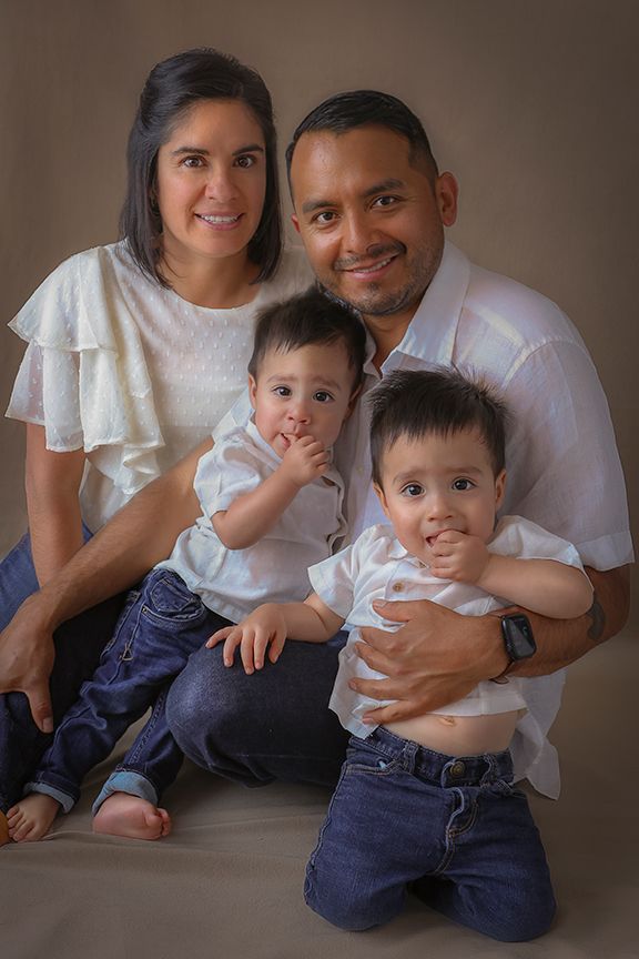 Best Family Photographer in Seattle, Tacoma, Bellevue and Gig Harbor captures mid 30's parents of twin boys in heart felt luxury photoshoot