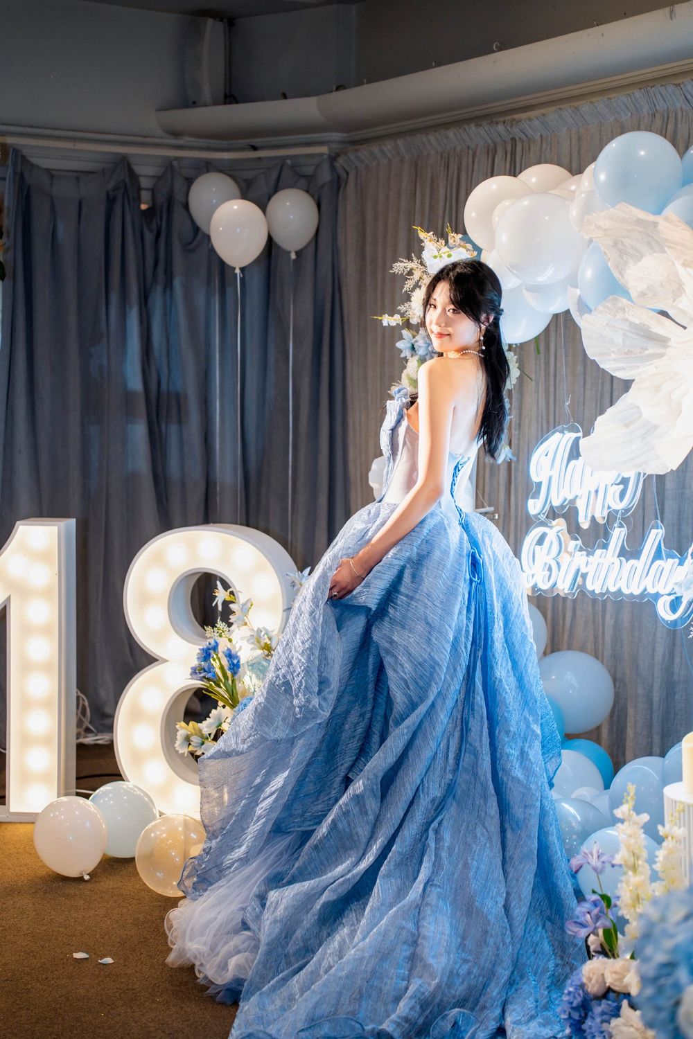 Stunning 18th birthday portrait of a girl in a blue dress at a grand Wintergarden Pavilion event, by Imagine Image Studio.