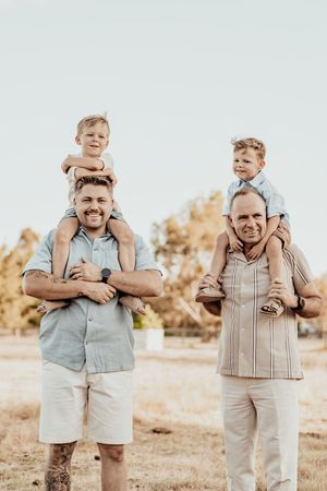 Playful family moments captured in a series of candid outdoor portrait shots.