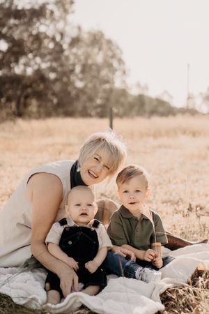 Joyful family interactions photographed during a casual outdoor portrait session.