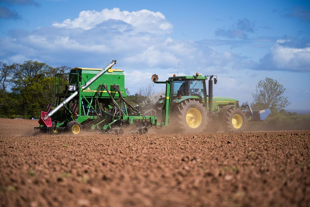 Tractor and seed drill