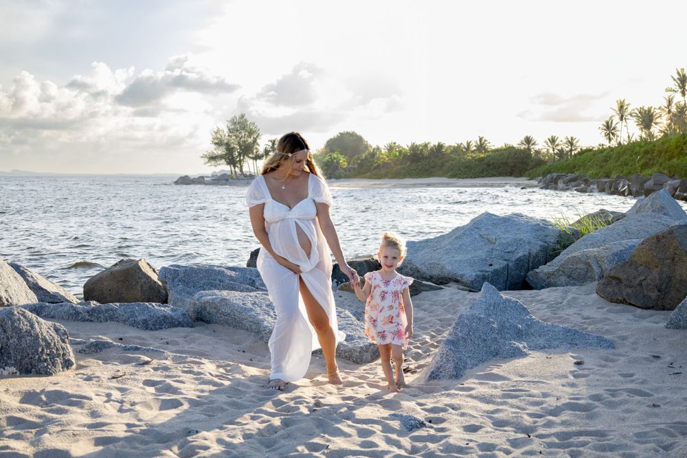 Maternity shoot with toddler at Fort Lauderdale Beach during sunset, taken by Wanderlust Studios