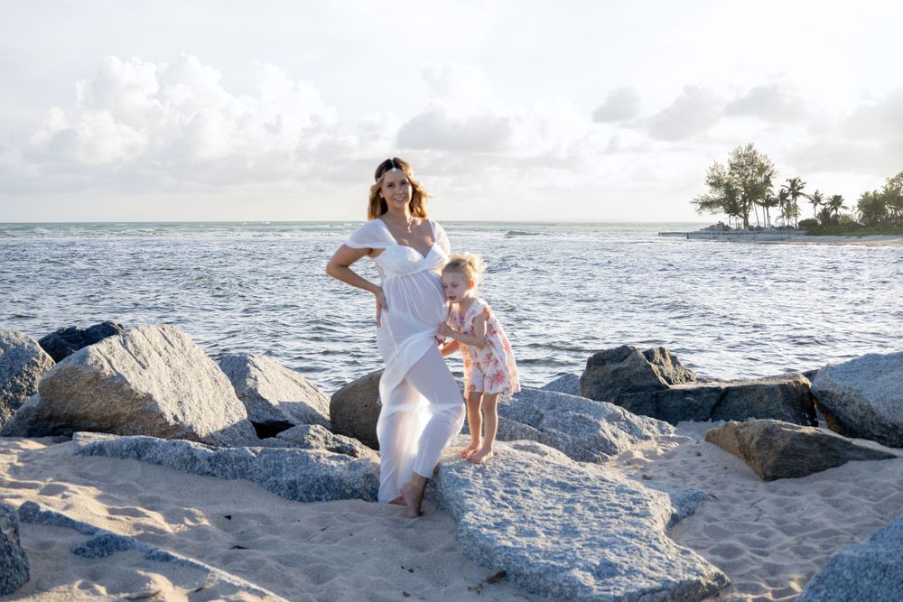 Maternity shoot with toddler at Fort Lauderdale Beach during sunset, taken by Wanderlust Studios