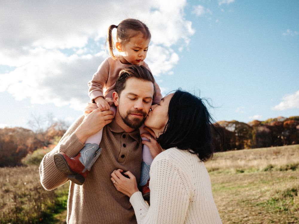 Beautiful outdoor family photoshoot in a sunny autumn meadow Belmont, MA.