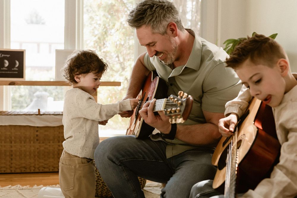 Edmonton Family Photographers.  Sherwood Park family photographer.  in home session.  natural moments guitar lessons. Edmonton photographers