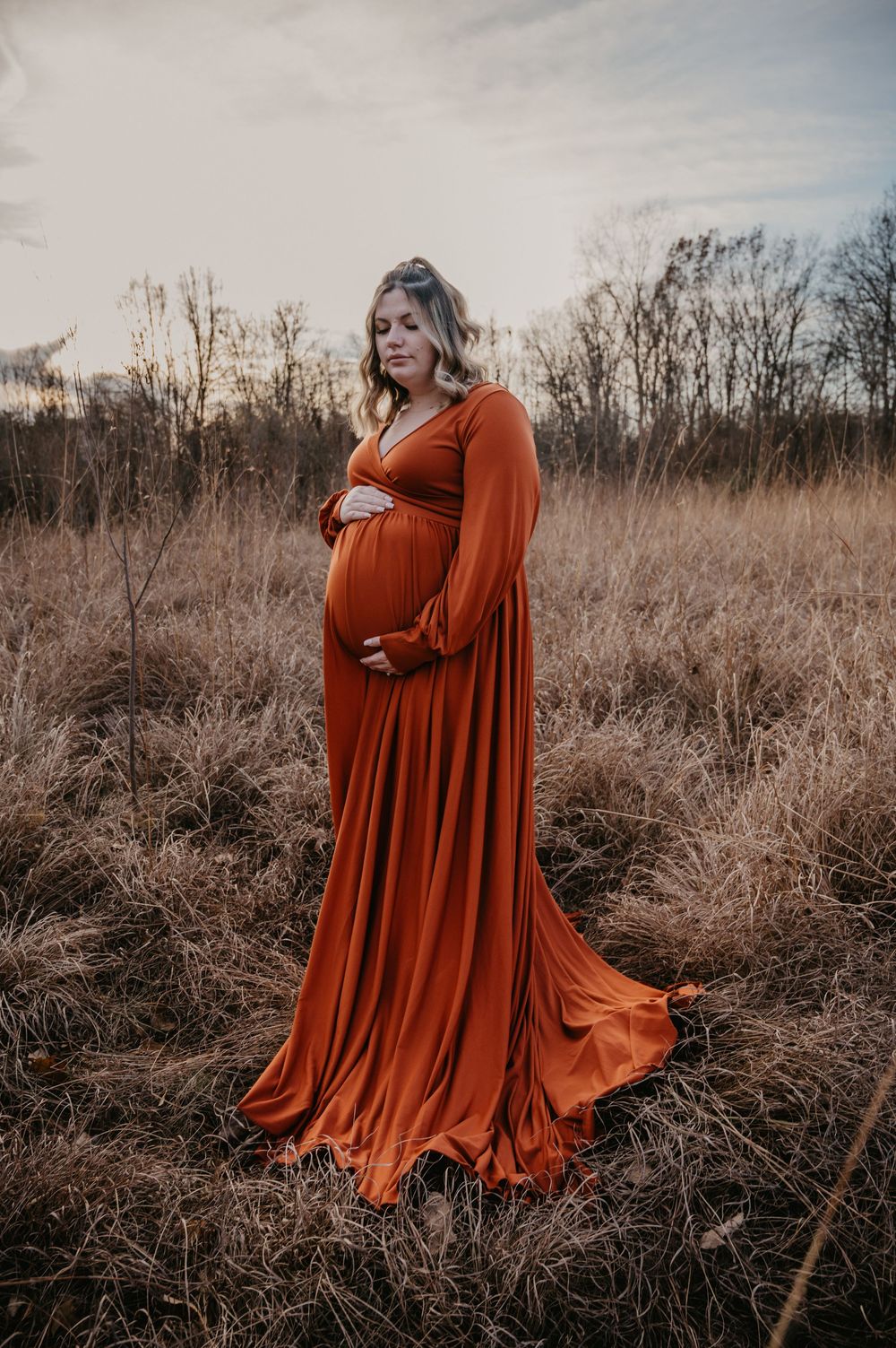 Mother-to-be during outdoor photo session Lapeer Michigan