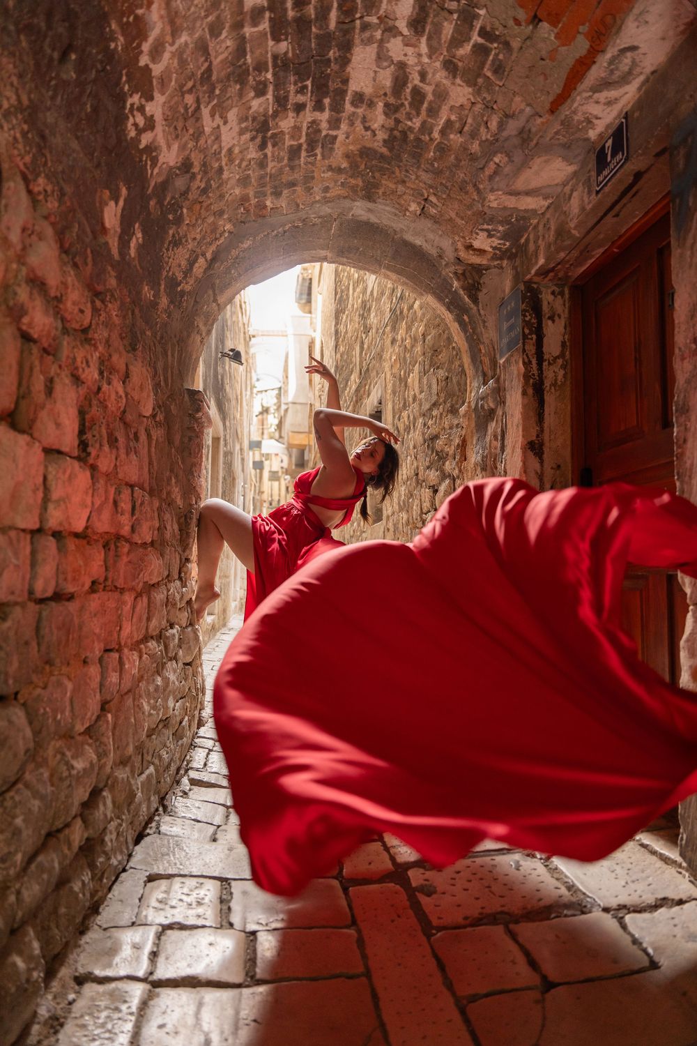 Red-pink official flying dress photo session in Split Croatia
