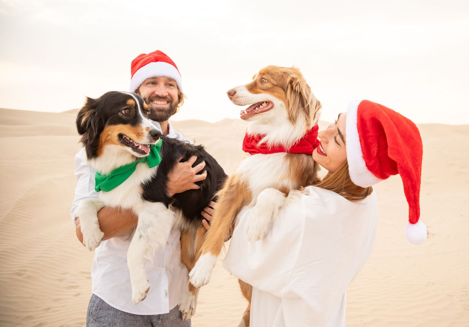 family with dogs couple christmas photoshoot romantic desert abu dhabi