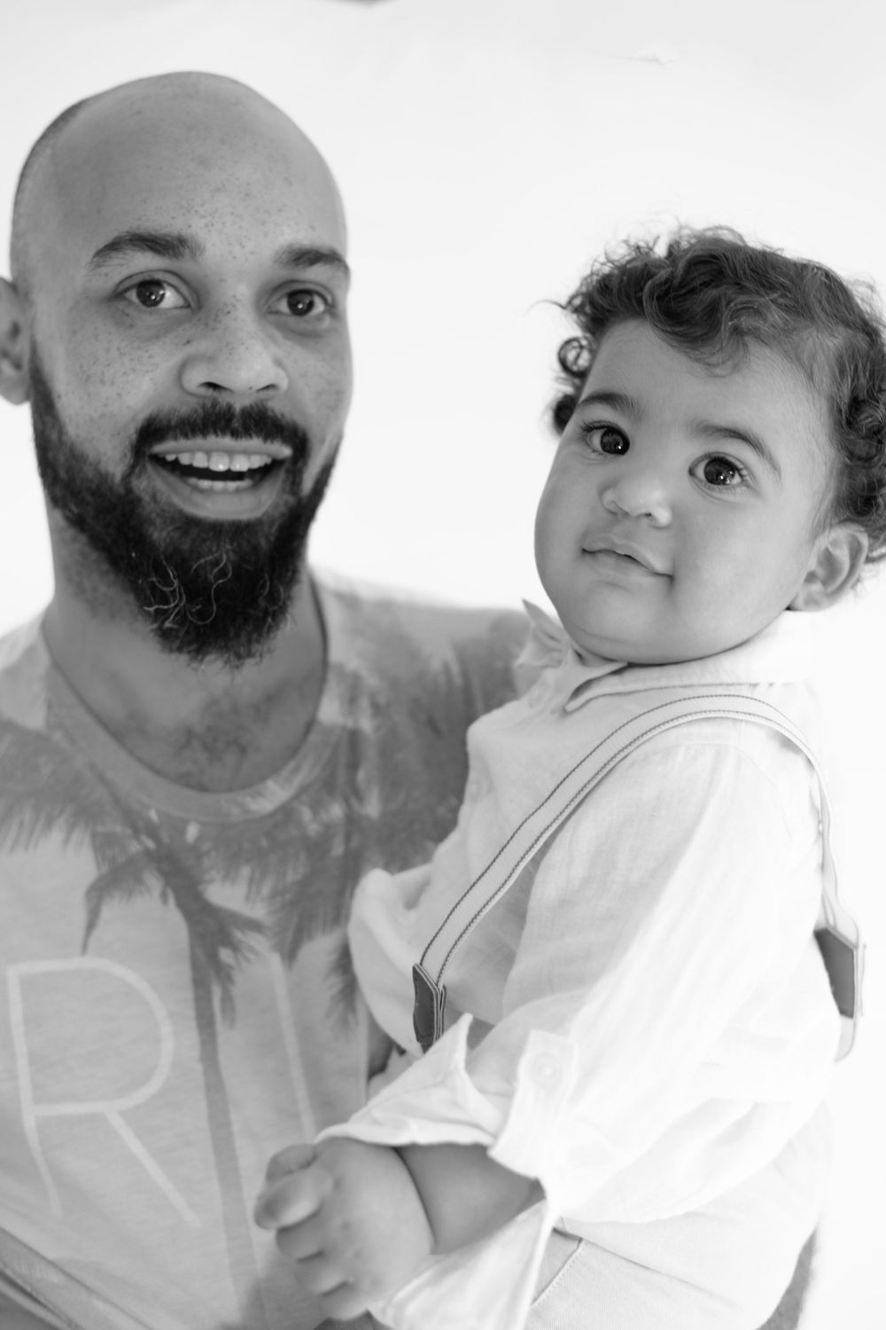 A heartwarming black and white portrait showing a tender bonding moment.