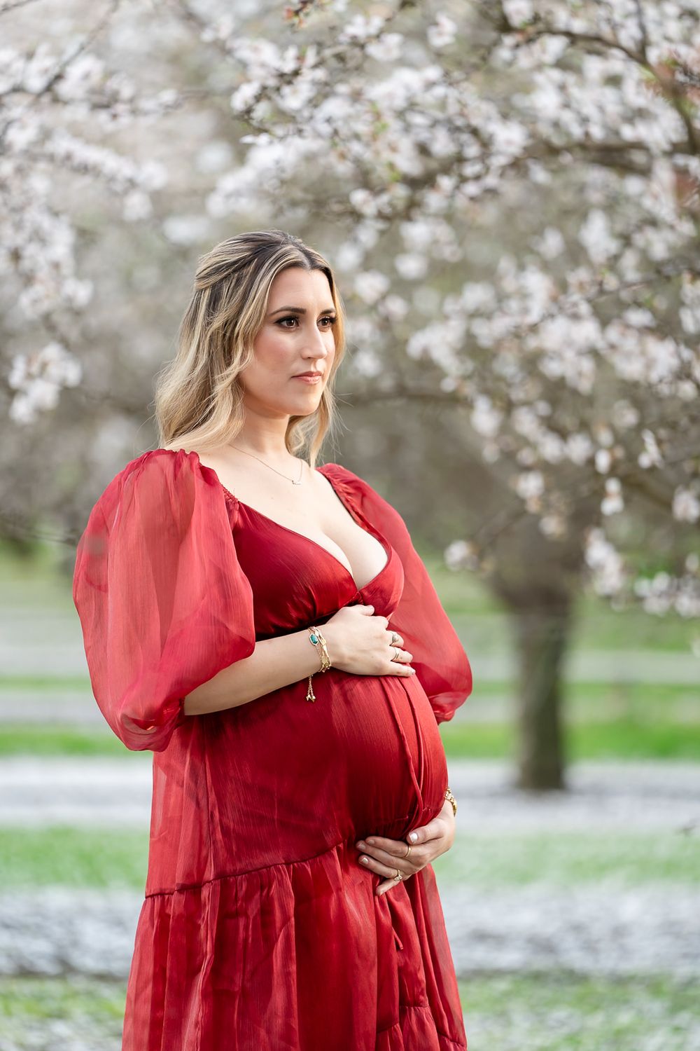Glowing maternity session in Tracy, CA almond orchard. Elegant and timeless outdoor photography for moms-to-be.