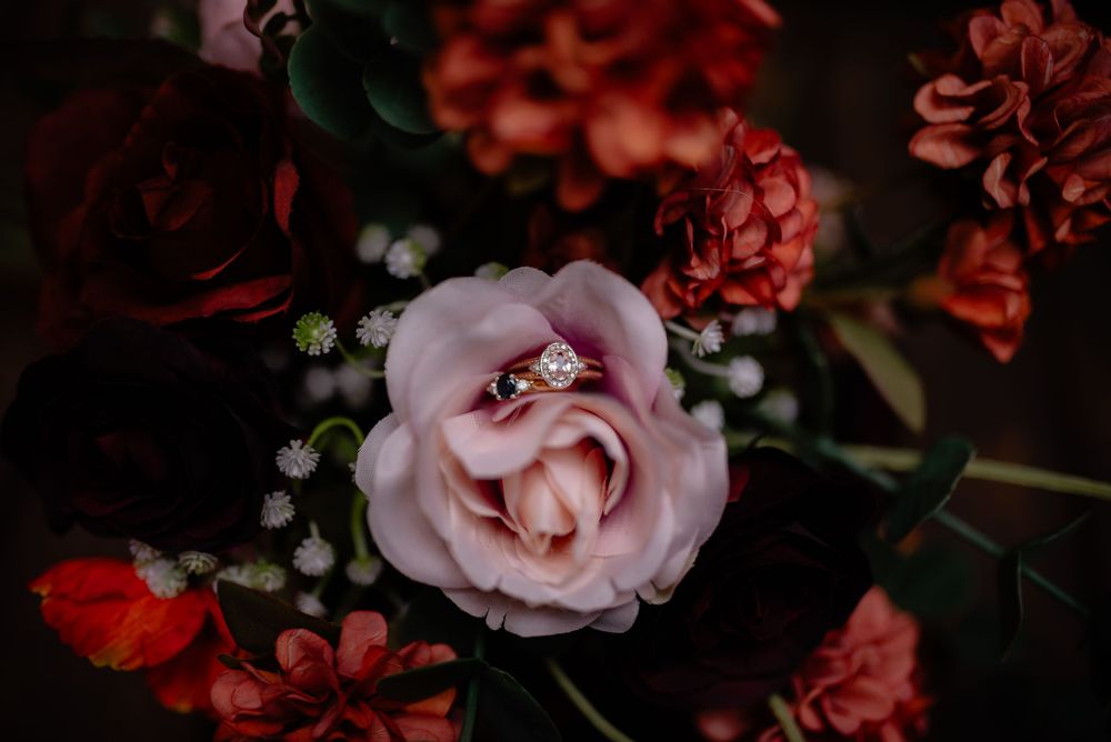 wedding rings close up in bouquet