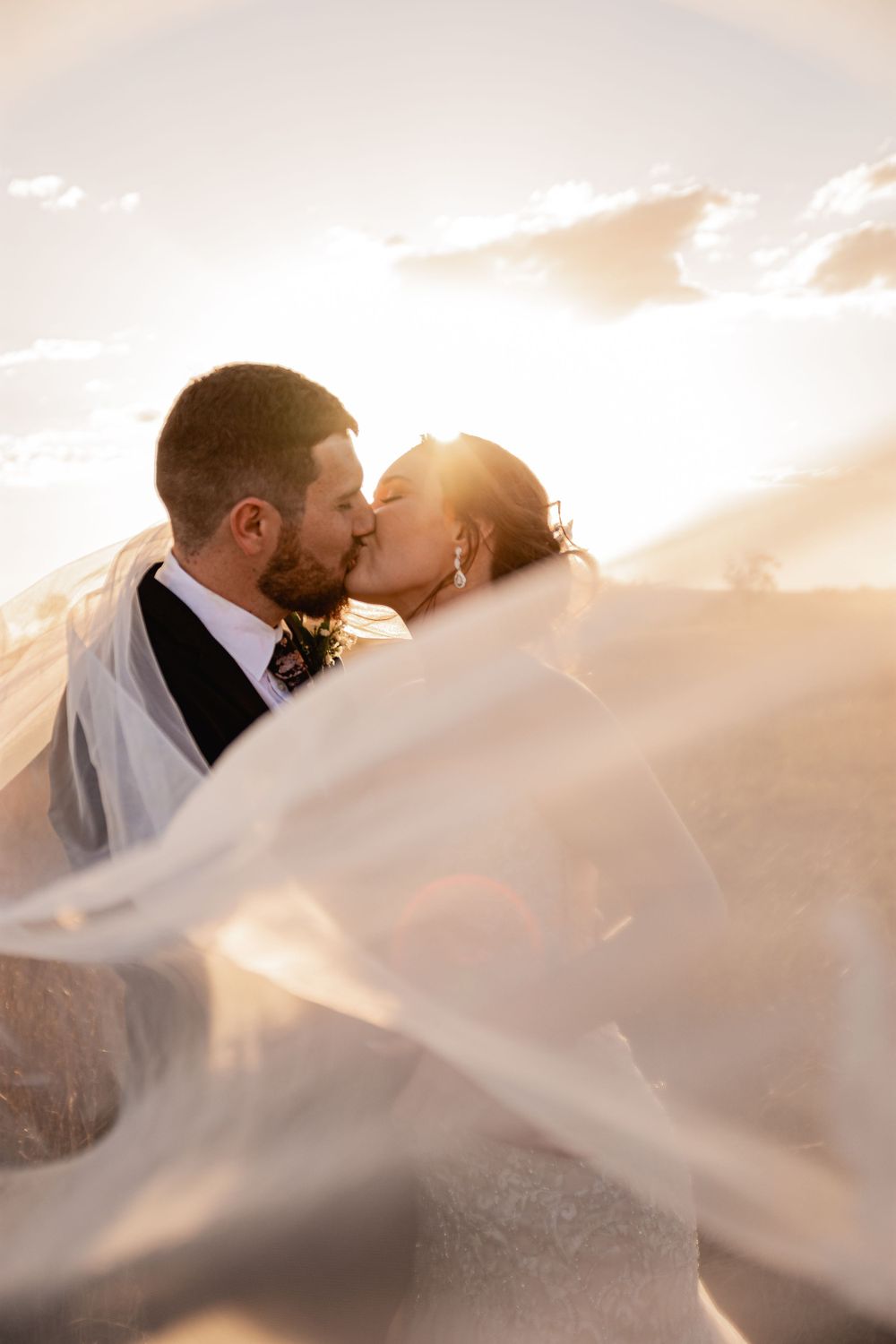 Bride and Groom Portraits veil shot