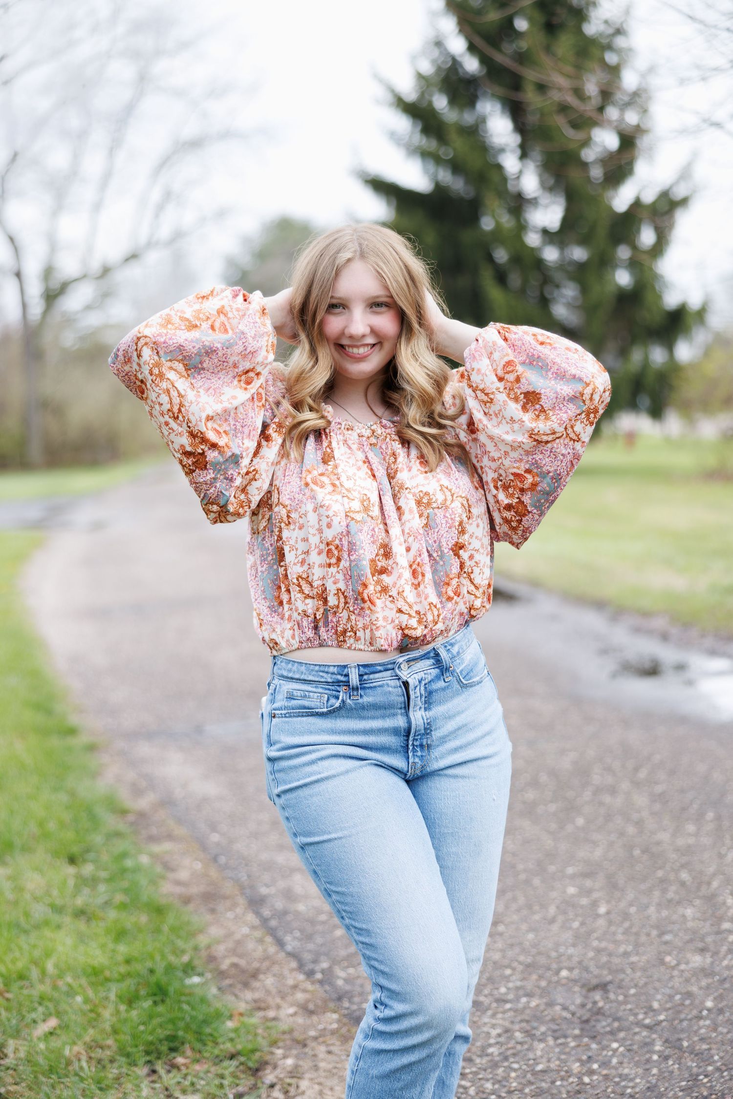 Senior photoshoot on a lane.