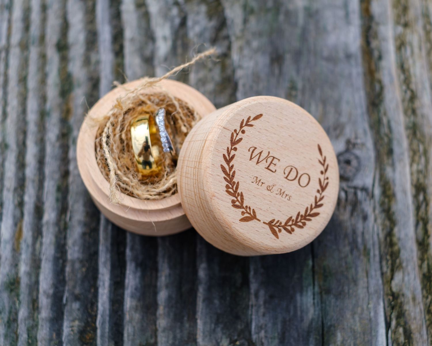 Lucy and Jamie's wedding rings in their lovely bespoke wooden box.