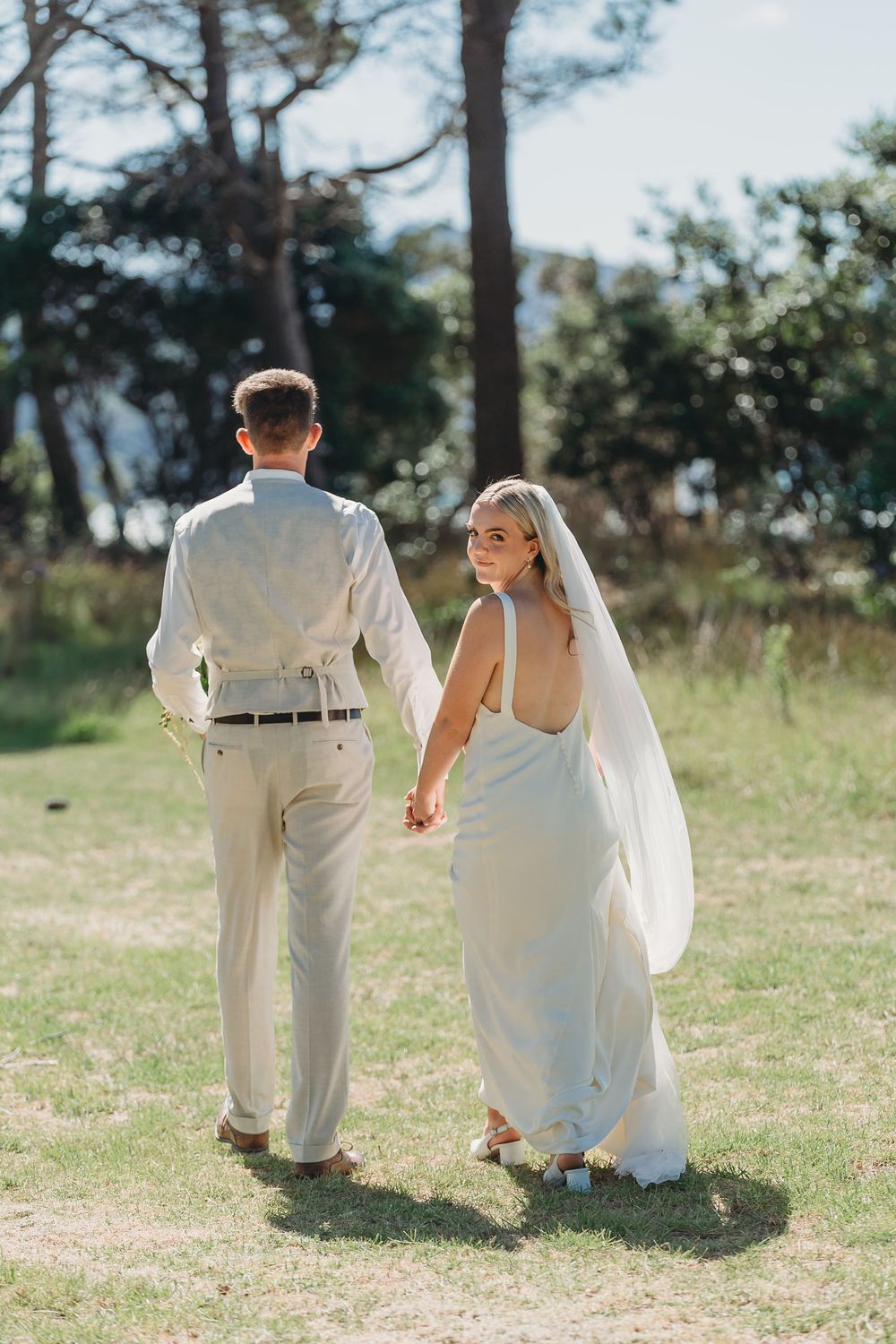 Josh and Libby at their wedding in Matarangi
