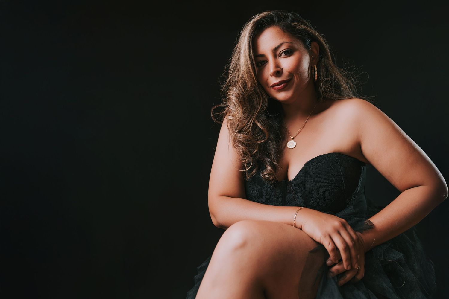 Fatima Photography studio owner self-portrait with dramatic lighting in Basildon, Essex