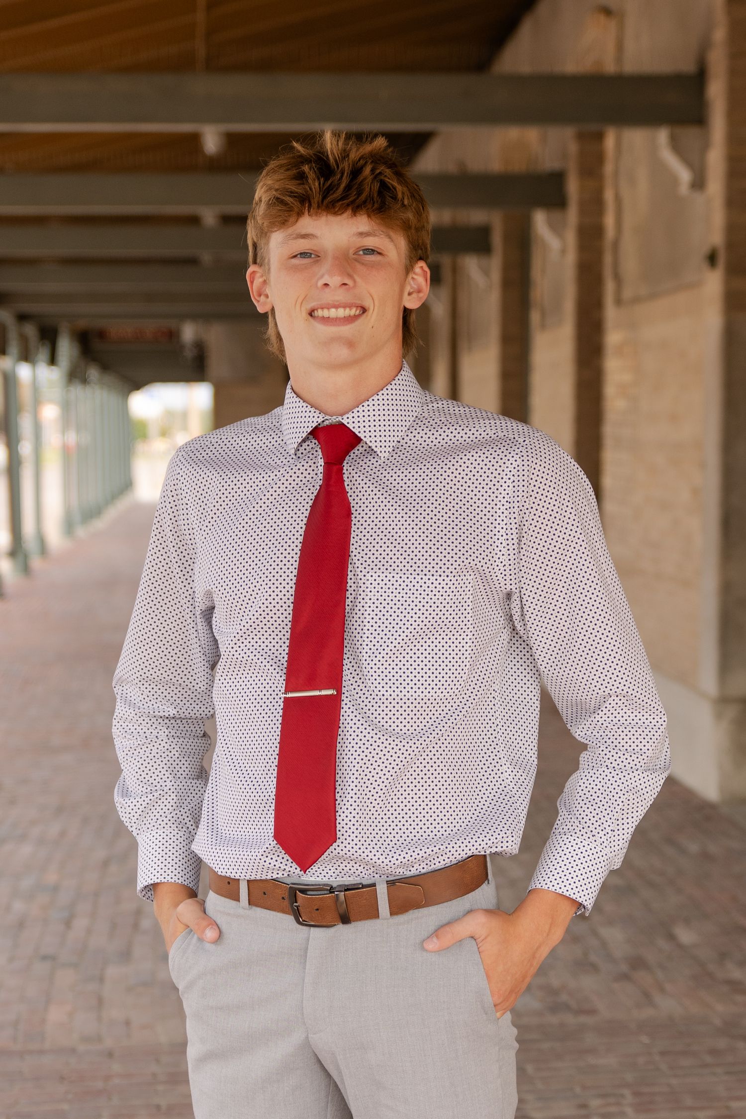 becky Katzberg photography senior boy dressed up in tie at train station