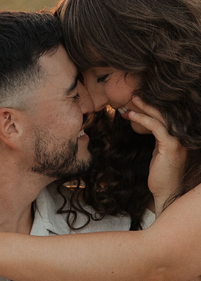 Romantic couple sharing intimate moments in a series of black and white close-up photographs.
