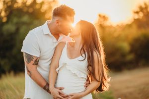 Sweet young couple poses at Sunset near Yale University
