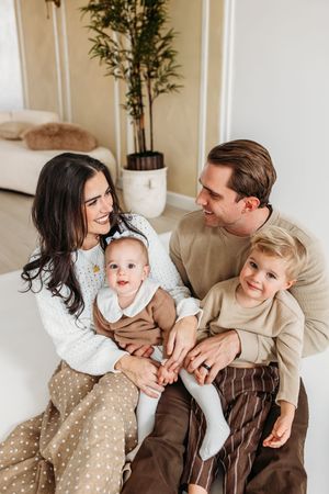 A family does a photo session in their home in Cheshire, CT