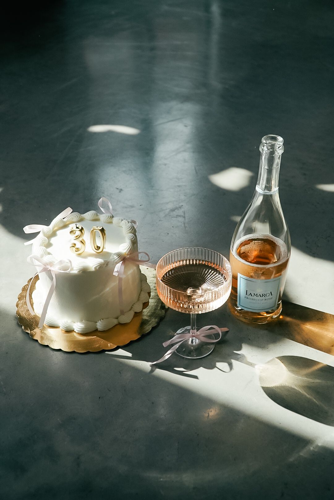Artistic series of still life photos showing perfume bottles and decorative objects casting dramatic shadows in sunlight.