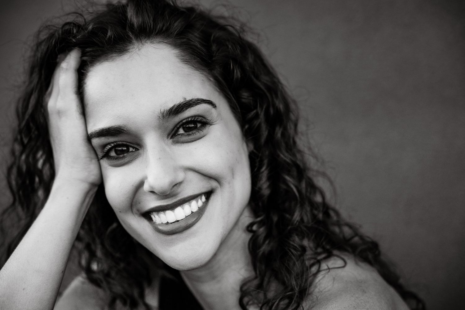Close-up portrait highlighting the subject’s genuine expression.