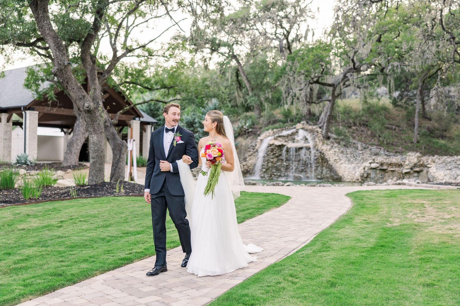 bride and groom celebrating after kiss