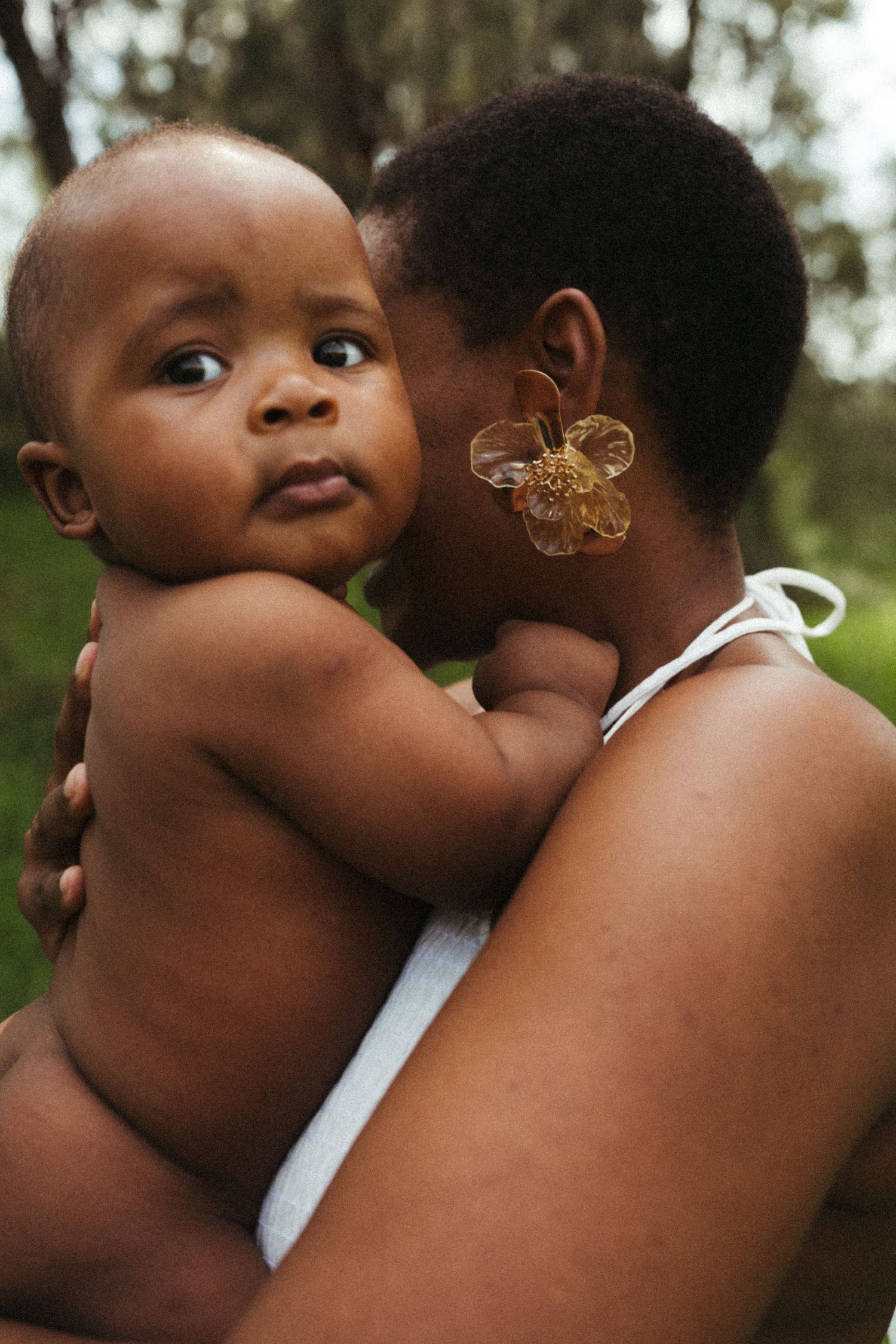 Intimate close-up portrait showing emotional connection between parent and child.