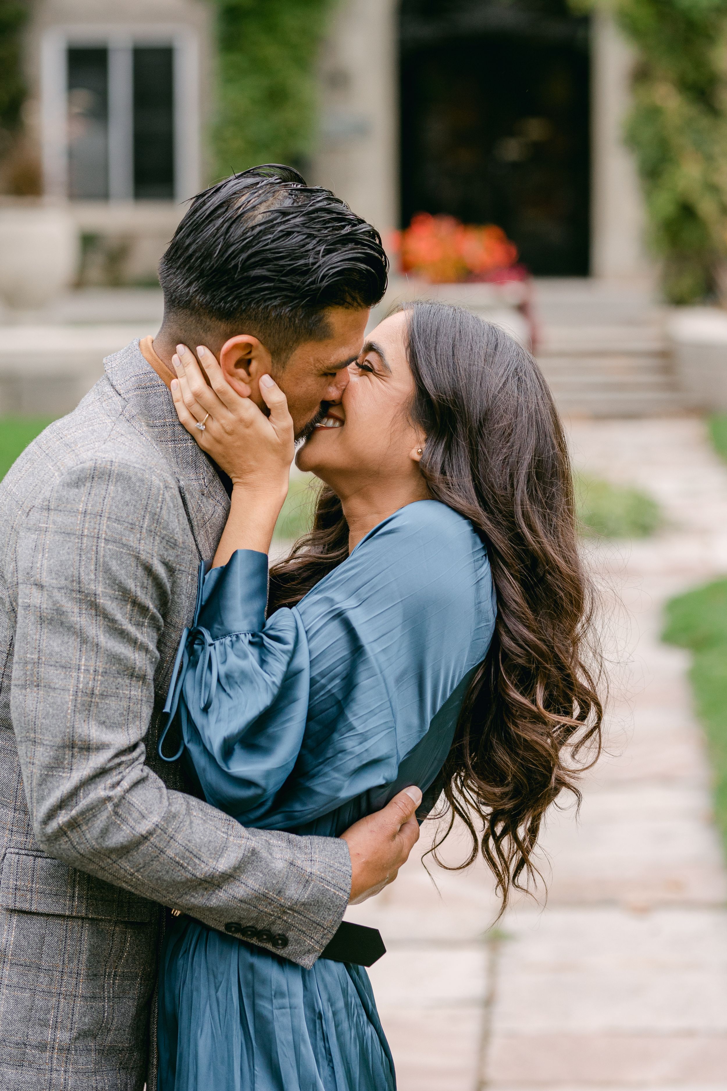 Progressive shots of intimate couple moment in blue and grey attire outdoors.