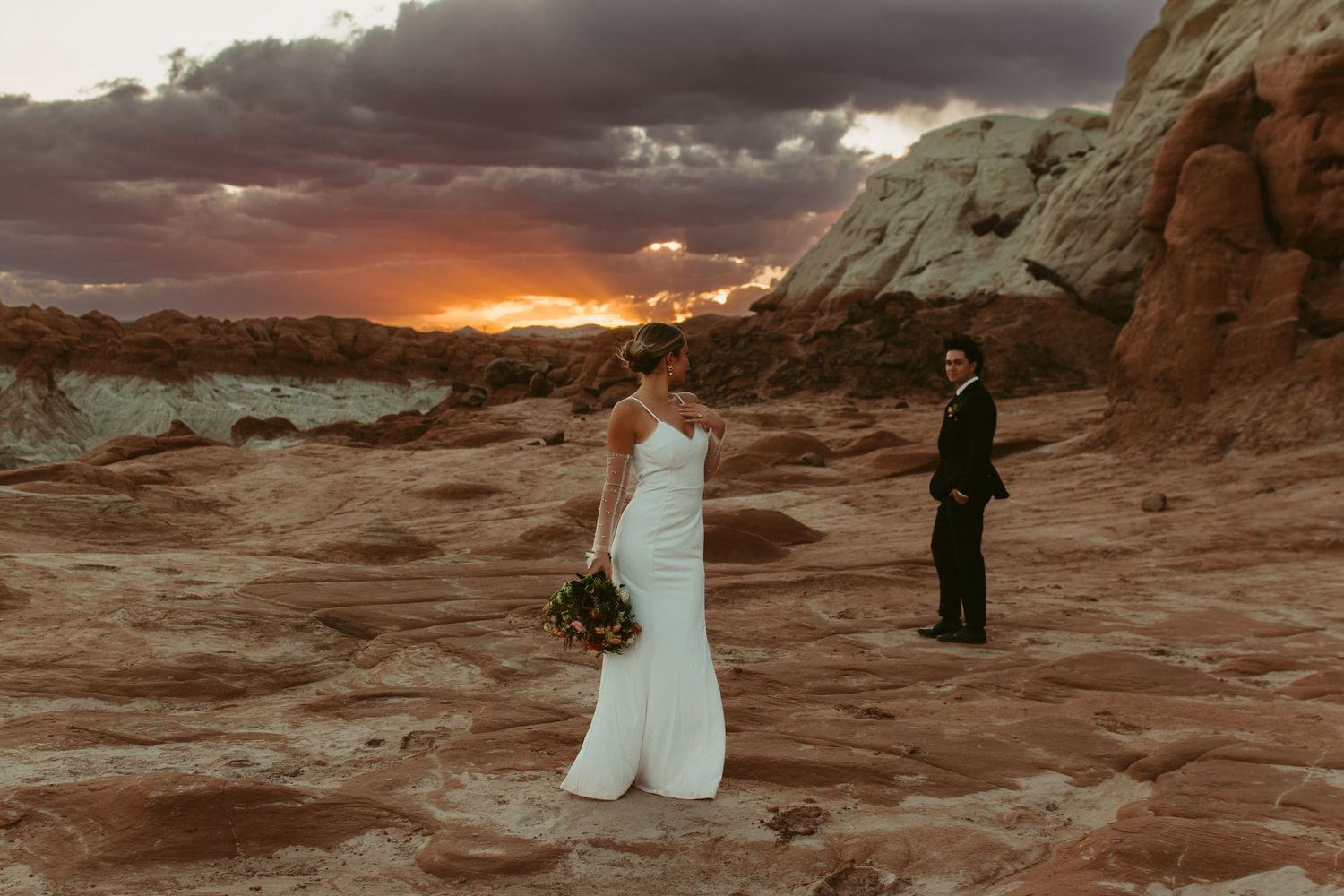 Romantic outdoor wedding portraits showing intimate moments between newlyweds.