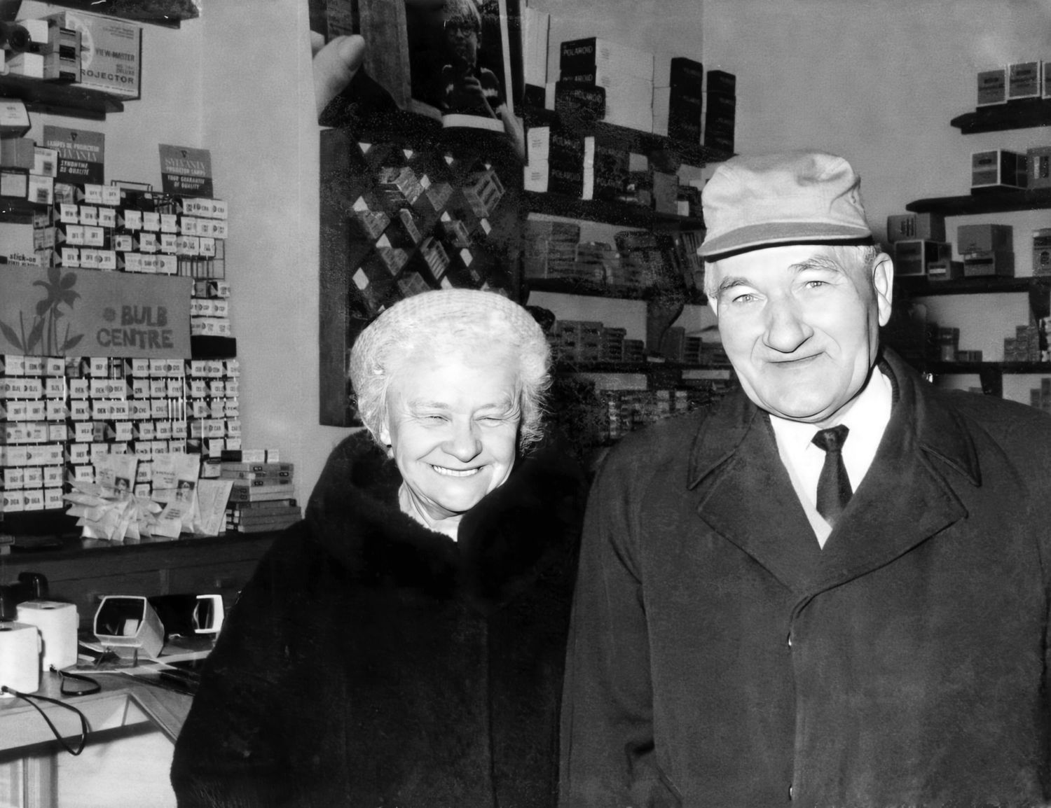 Vintage black and white photograph showing interior of old general store.