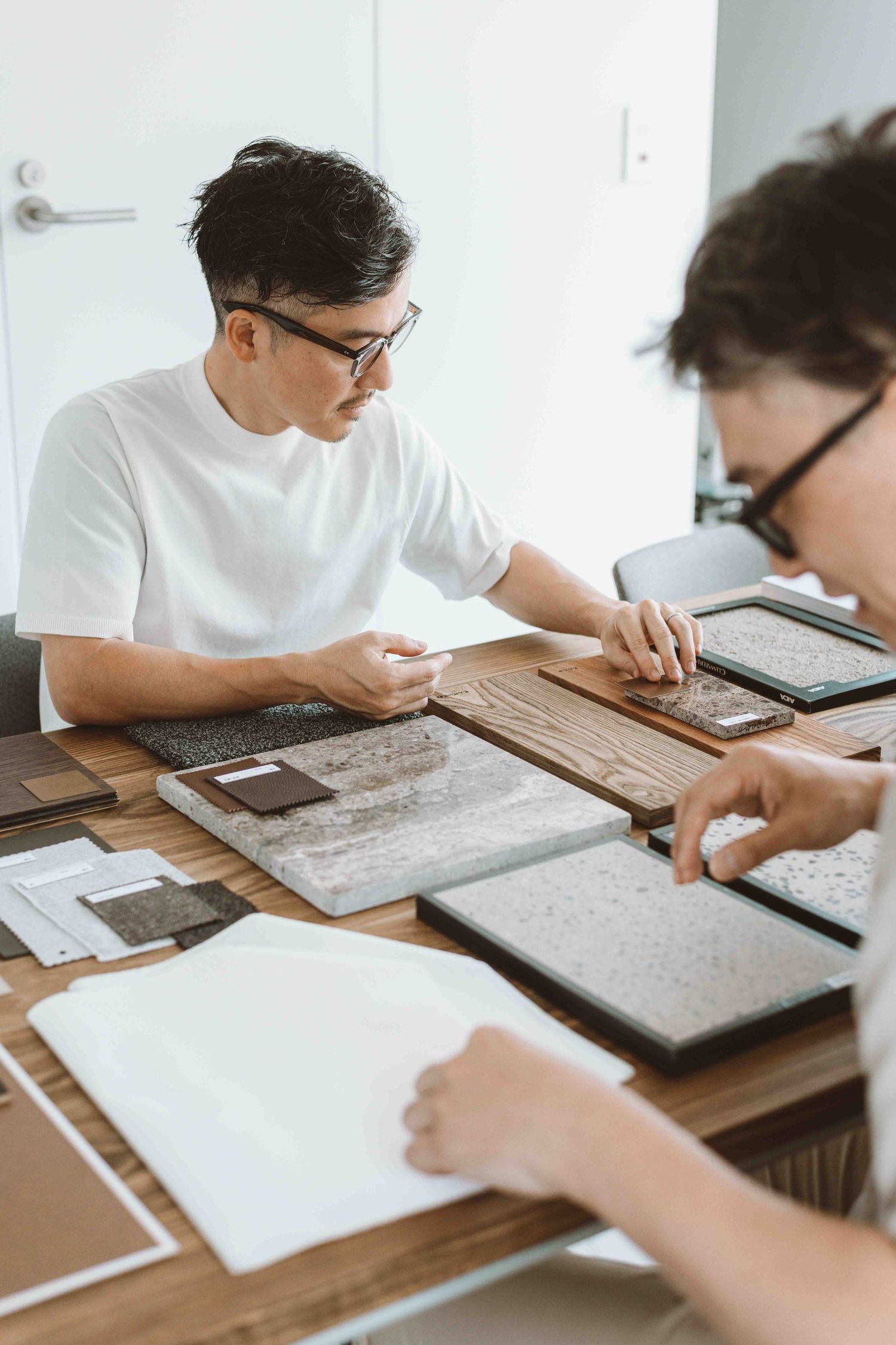 Creative professionals working at their desk for personal branding