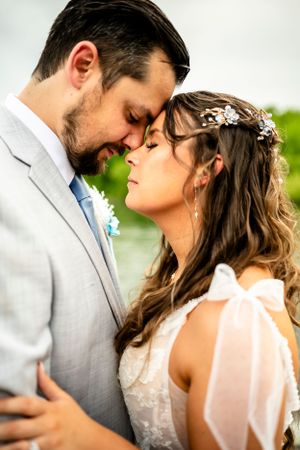 Intimate wedding portraits showing tender moments between bride and groom.