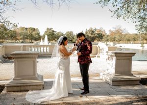 Wedding photo session at classic stone balustrade with autumn scenery.