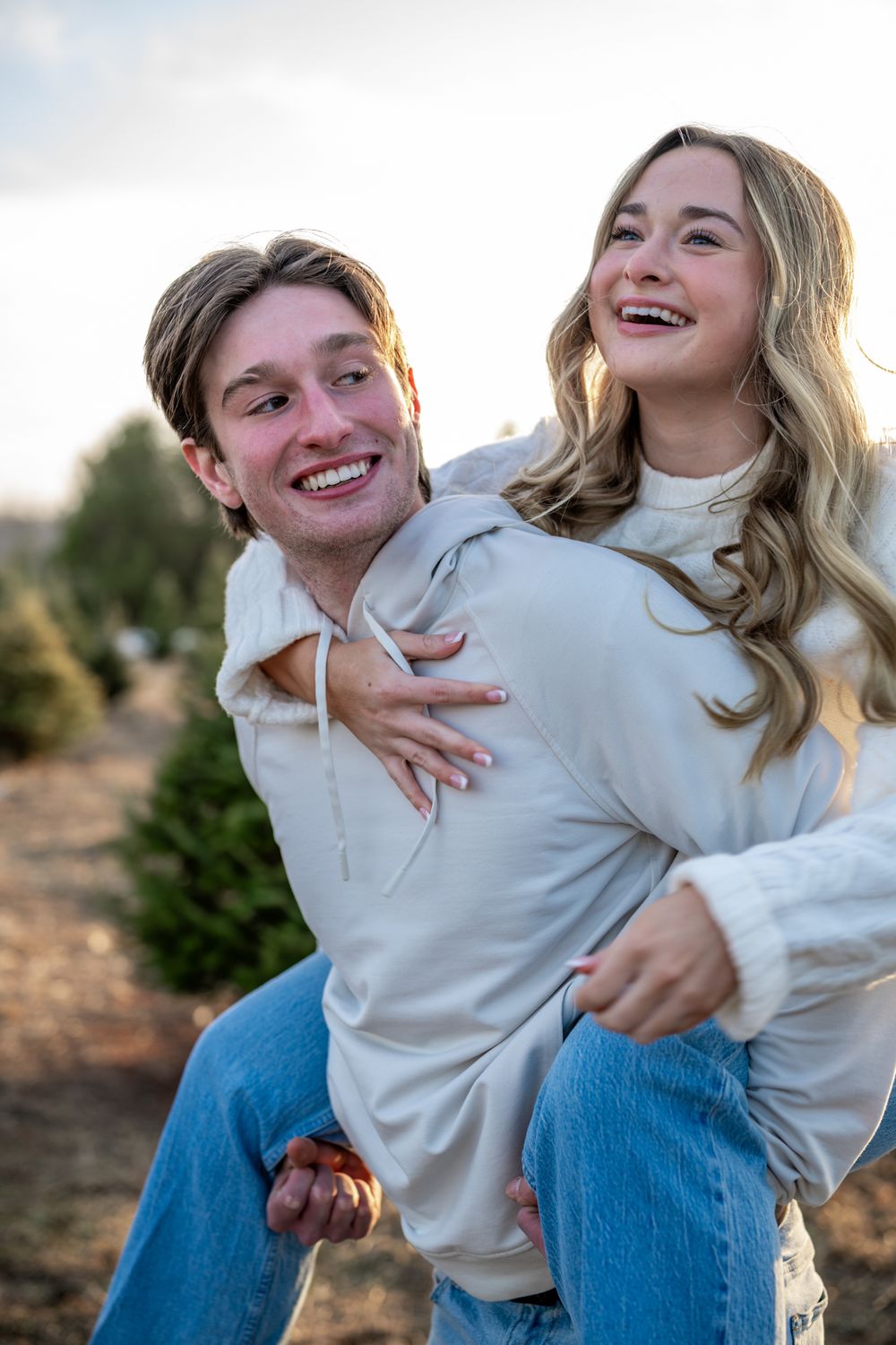 A female on her boyfriend's back.