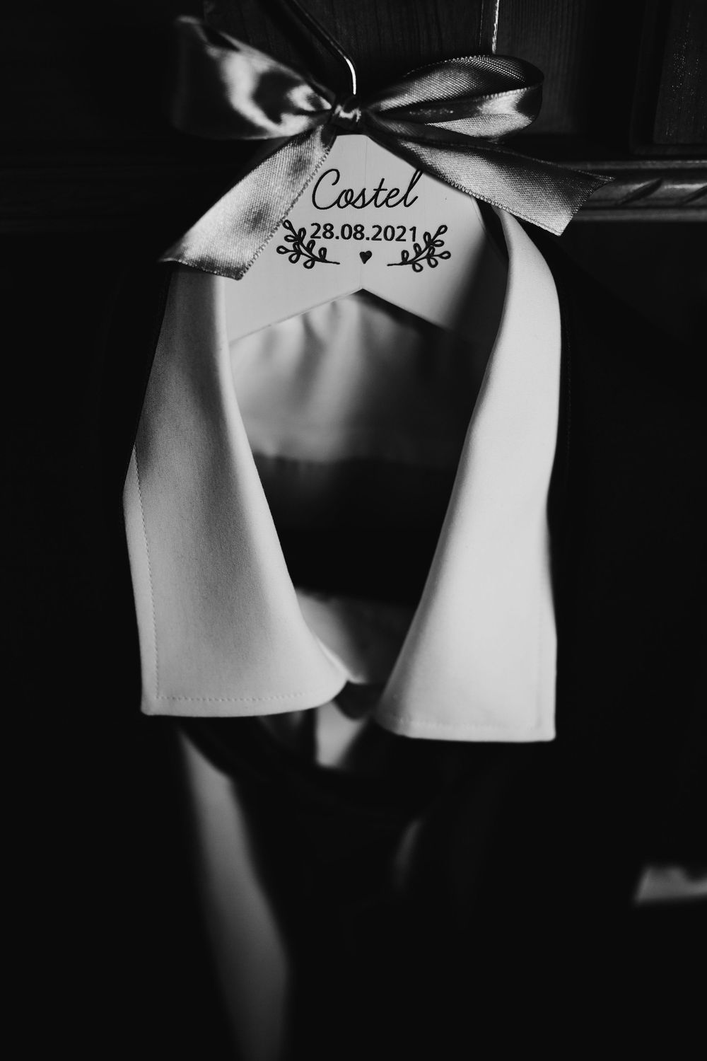 Black and white photo of personalized wedding gift bag labeled Costel dated 28.08.2021.