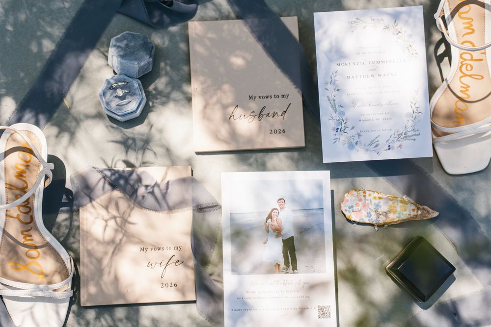 Romantic wedding photo at The English Country Barn of the Carolinas featuring a couple in soft spring light. Photo and Video team.
