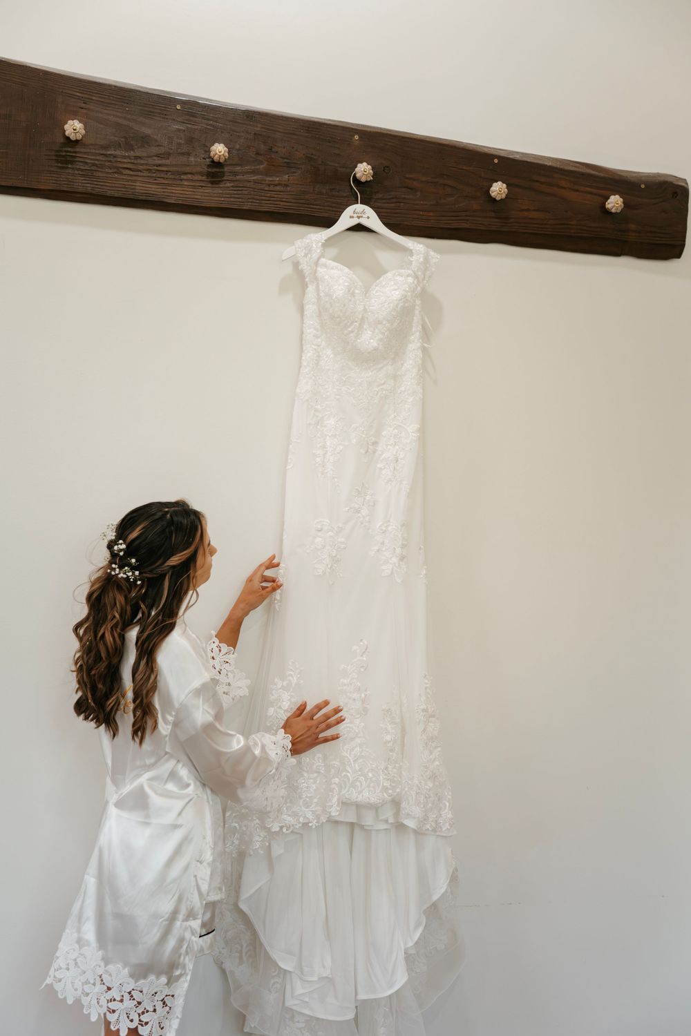 Romantic wedding photo at The English Country Barn of the Carolinas featuring a couple in soft spring light. Photo and Video team.